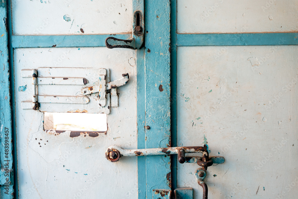 custom made wallpaper toronto digitalThe scary and rusty door to the detention cell in the prison. The concept of conviction and the penitentiary system.