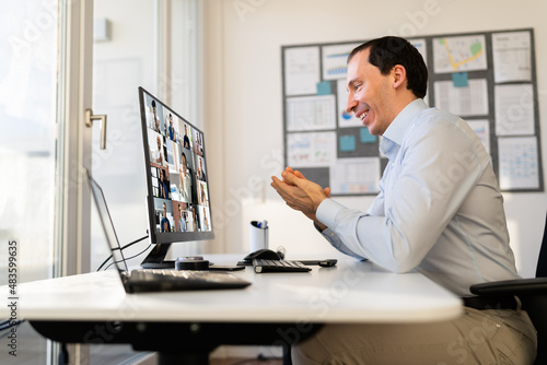 Man Clapping In Online Video Conference Business