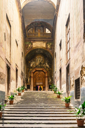 Fototapeta Naklejka Na Ścianę i Meble -  Chiostro di San Gregorio Armeno. Entrance of the cloister of Armenian sanctuary in Naples, Italy