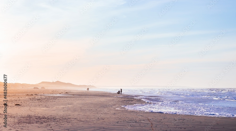 Seascape of North Sea beach at Blokhus, during the sunset of pastel colors. Nordjylland (North Jutland Region), Denmark