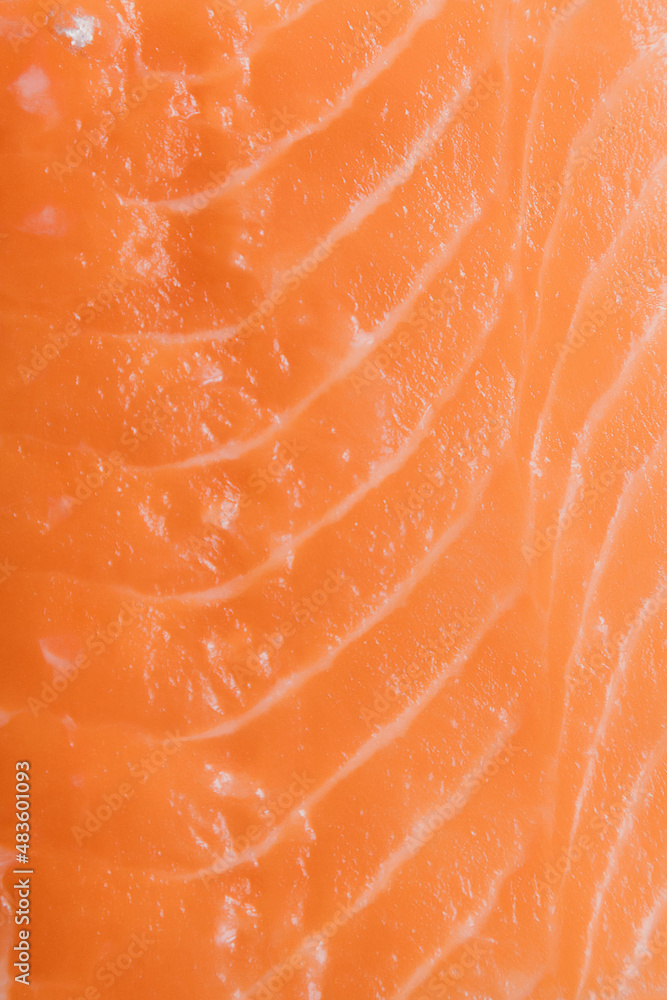close up raw salmon fillet slices texture