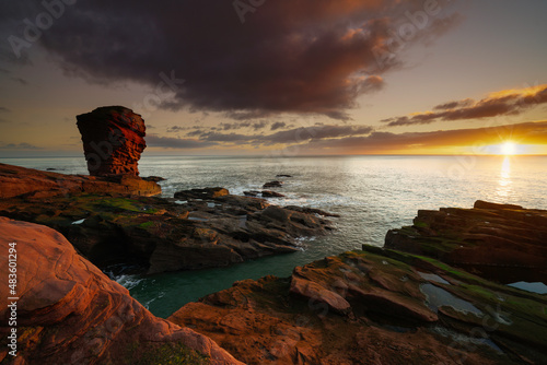 Sunrise view of the coastline at Arbroath, Angus Scotland.  photo