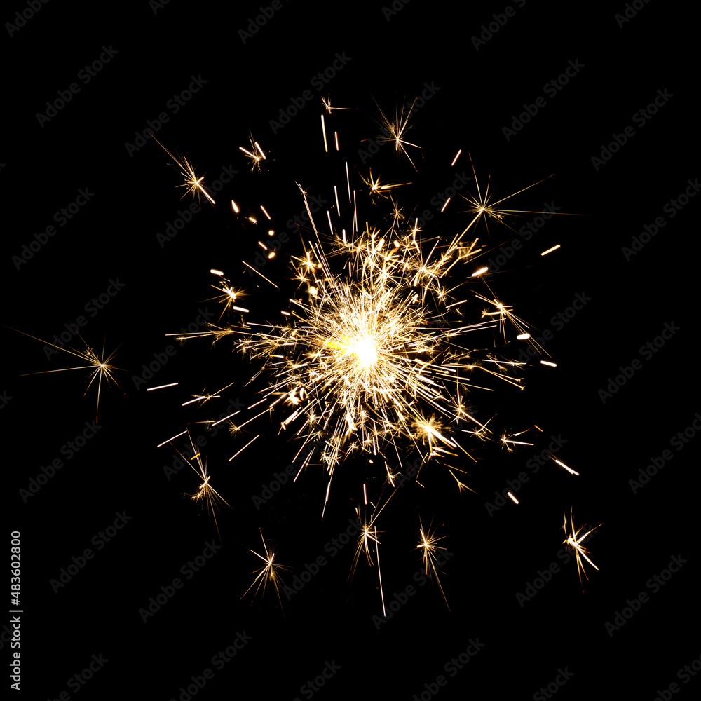 Fototapeta premium Bright sparks against black background