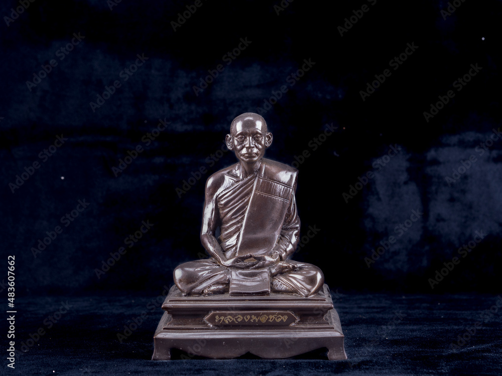Statue of a monk at a ceremony