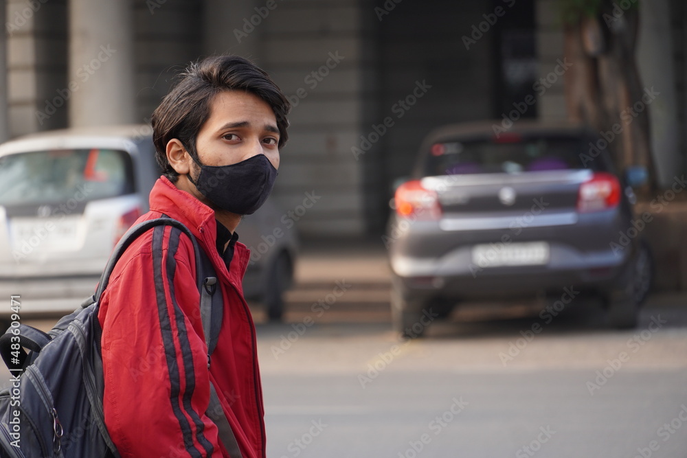 Effective protection against coronavirus. Man wearing hygienic mask to prevent infection, respiratory illness such as flu, 2019-nCoV, Covid-19.