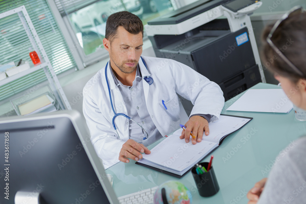 doctor and patient are discussing something doctor and patient are discussing something