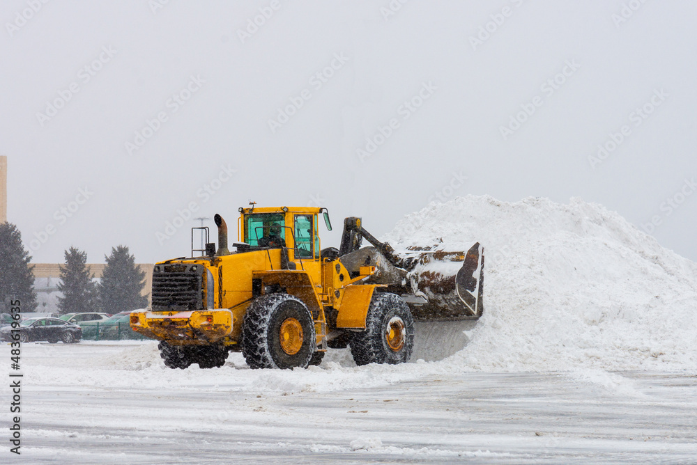 large yellow snow plow