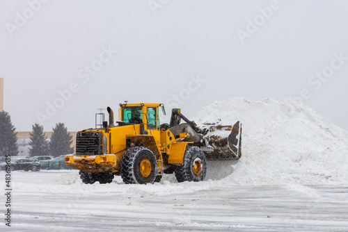 large yellow snow plow