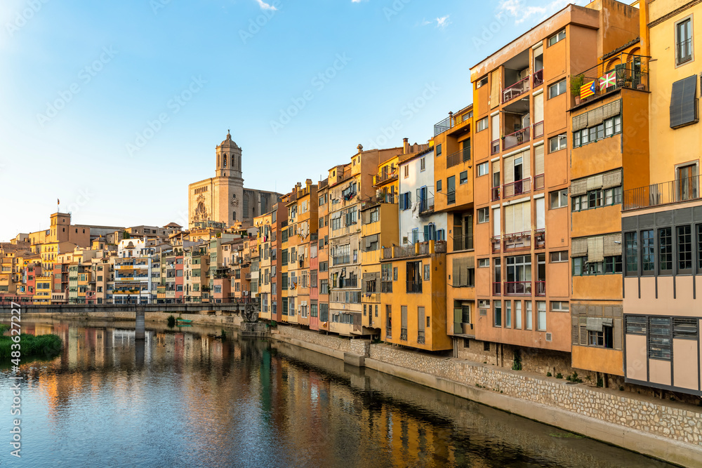 view of the city of Girona in the historic center with the cathedral in Catalonia in Spain at sunset