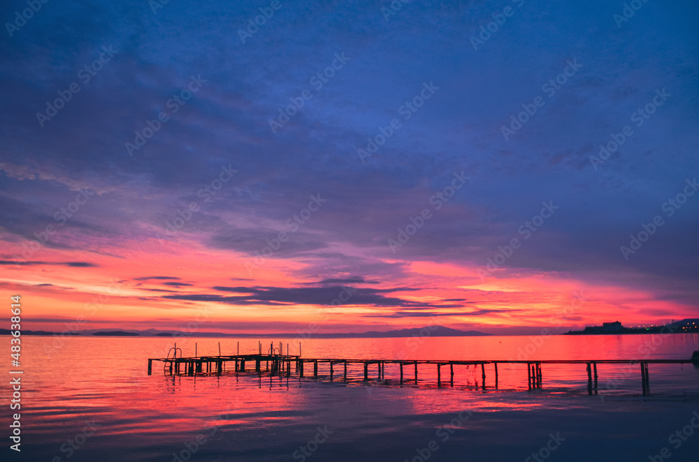 sunset reverse light sun after sunset blue hours tree people lighthouse birds watching sunset taking photo landscape sunset reverse light sun after sunset blue hours tree people lighthouse birds watching sunset taking photo landscape