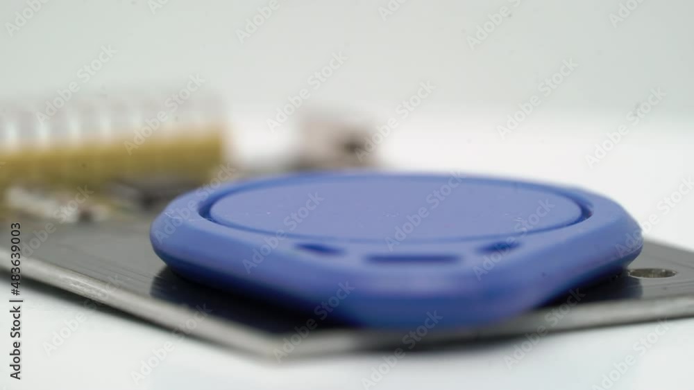 RFID key keychain blue electronic component. Copy clone digital card lock. RFID key keychain blue electronic component. Copy clone digital card lock.