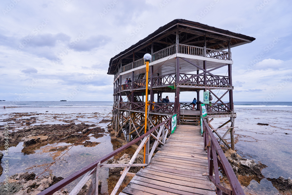 Wooden bridge on the beach, Siargao Island Philippines.