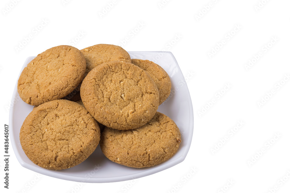 Close up view of white plate with oatmeal cookies isolated on white background. Close up view of white plate with oatmeal cookies isolated on white background.