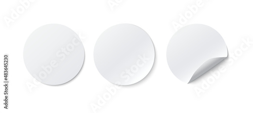 Circle adhesive stickers. Realistic vector white paper round stickers with peeling corner and shadow isolated on white background