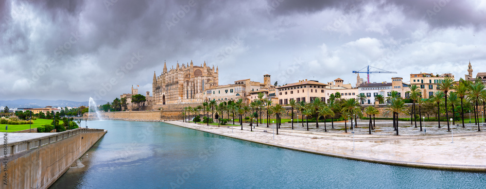 impressive panoramic view of the historic part of the old town Palma de Mallorca, the marine park and Cathedral La Seu or Palma Cathedral - pearl of the spanish Balearic Island, warm winter in Spain