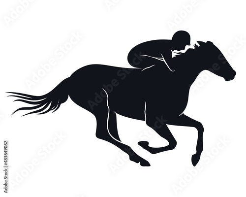 Silhouette of horseback rider on galloping horse