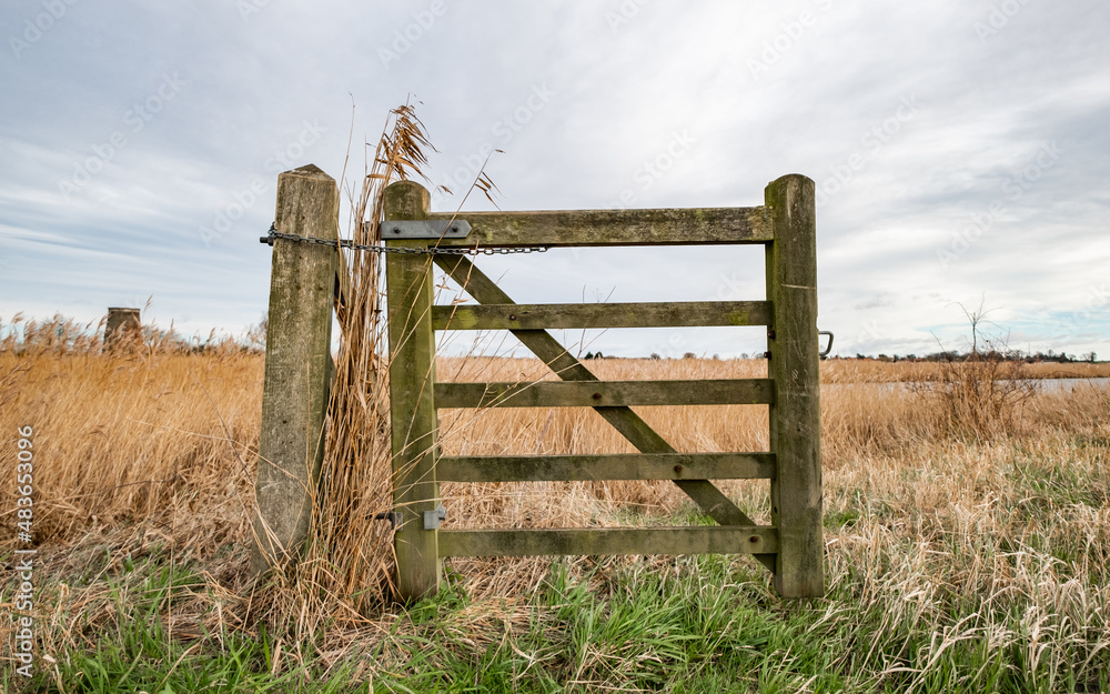 Wooden gate on a public footpath along the River Bure in Norfolk, UK