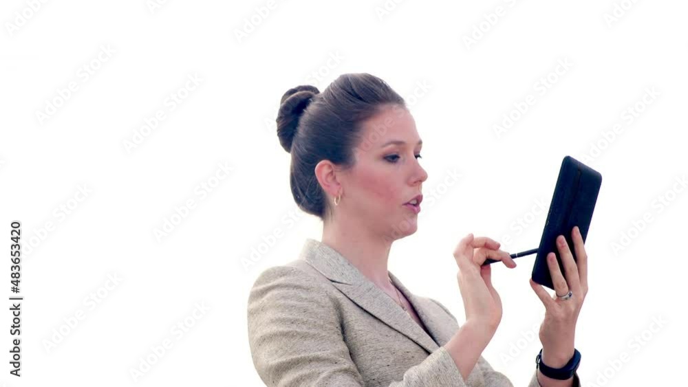 Businesswoman uses stylus on tablet on white background. Businesswoman uses stylus on tablet on white background.