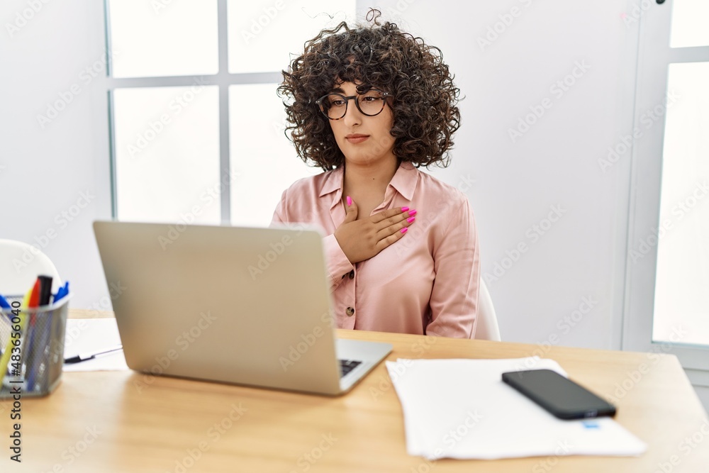 Young middle east woman having video call communicating with deaf language at office Young middle east woman having video call communicating with deaf language at office