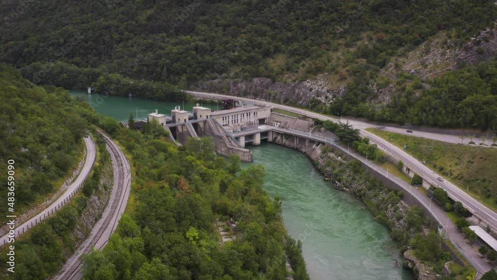 hydroelectric power station river forest mountains road cars aerial cinematic drone footage hydroelectric power station river forest mountains road cars aerial cinematic drone footage