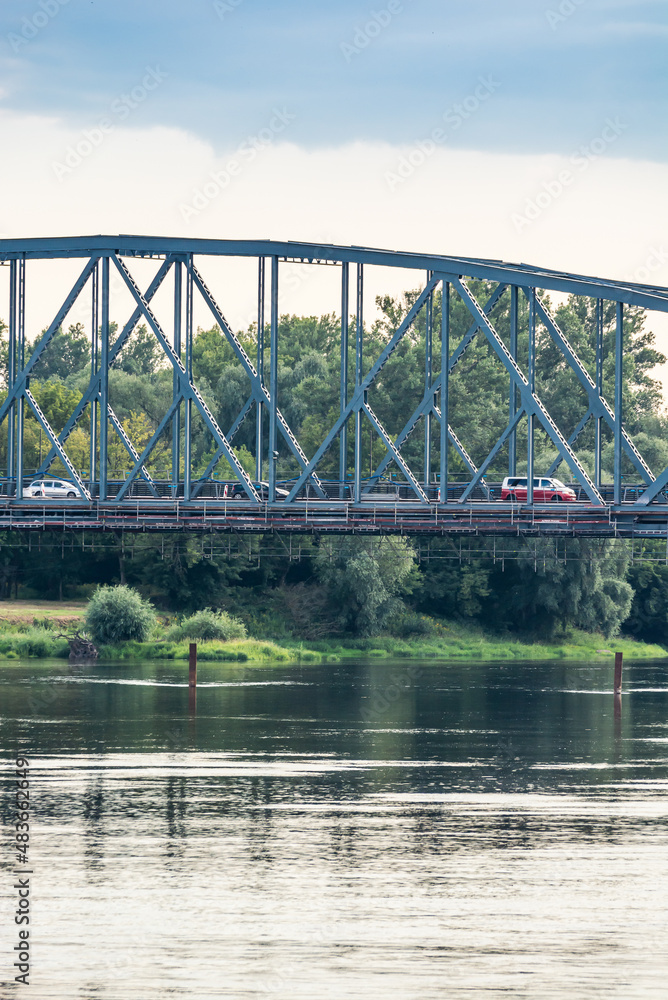 Torun, Poland - August 11, 2021. Jozef Pilsudski bridge over Wisla river in Summer