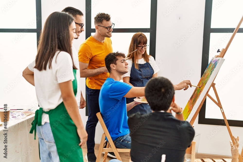 Group of people smiling happy drawing at art studio. Group of people smiling happy drawing at art studio.