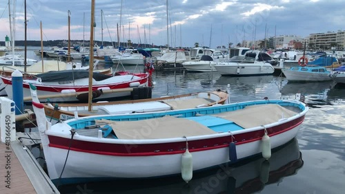 Small boats moored in a port in calm weather