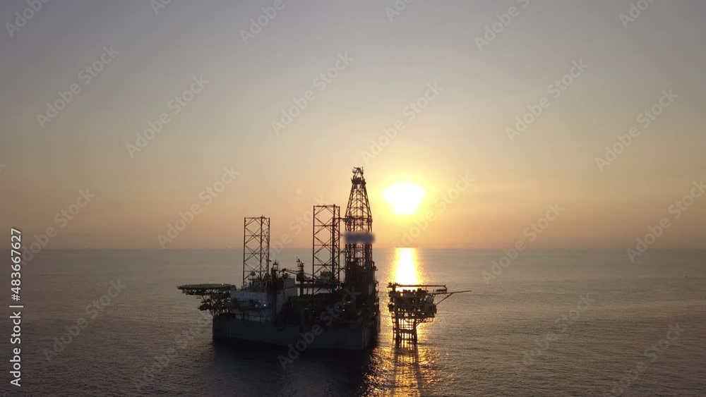 Aerial view from a drone of an offshore jack up rig at the offshore location during sunrise time
Aerial view from a drone of an offshore jack up rig at the offshore location during sunrise time