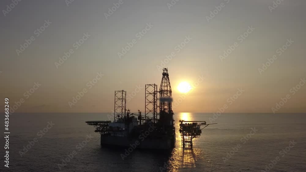 Aerial view from a drone of an offshore jack up rig at the offshore location during sunrise time
Aerial view from a drone of an offshore jack up rig at the offshore location during sunrise time