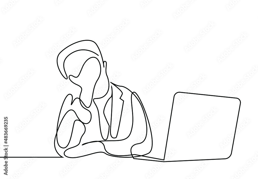 an office worker tired at the computer