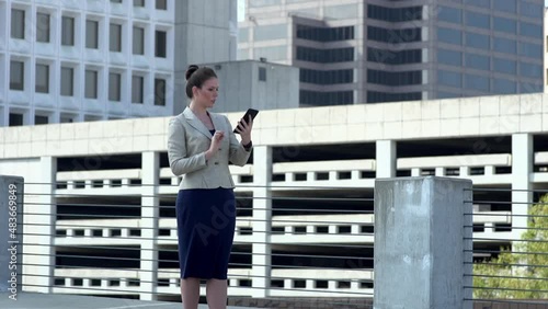 Ecstatic Businesswoman reacting to news on tablet