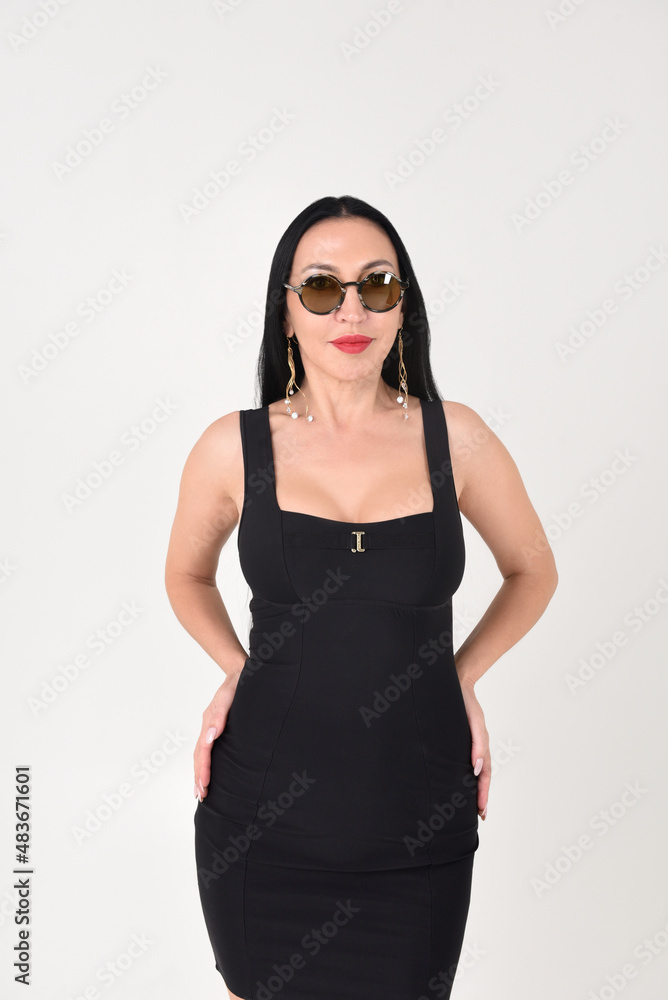 Face or portrait of a beautiful stylish brunette girl on a white background in the studio