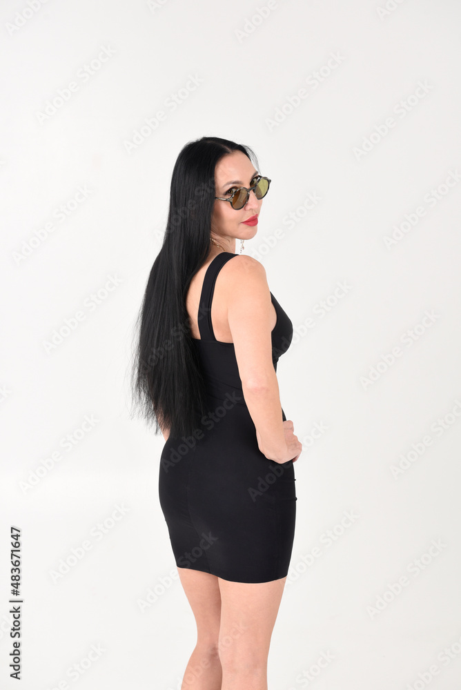 Face or portrait of a beautiful stylish brunette girl on a white background in the studio Face or portrait of a beautiful stylish brunette girl on a white background in the studio