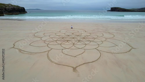 Aerial Of Sand Art Drawn On Oldshoremore Beach. Parallax View photo