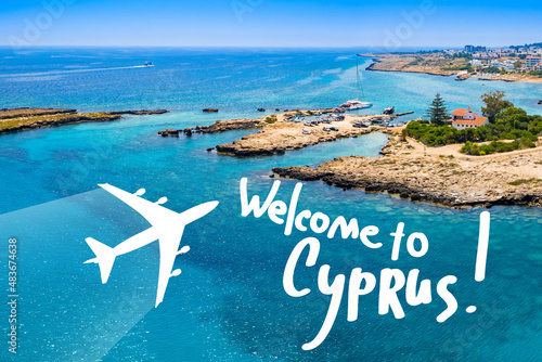 Air Travel in Cyprus. Airplane silhouette and logo welcome to Cyprus. Air Tourism in Mediterranean Islands. Limassoll city coast scenery in background. Invitation to travel to Cyprus photo