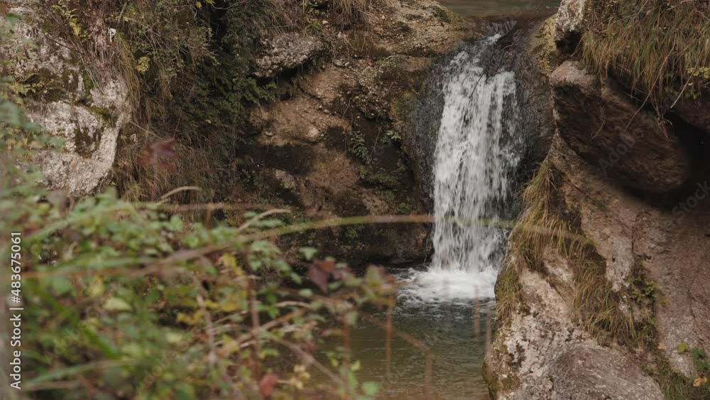 Static view of waterfall in the rocks and small pool of water. Italy. Static view of waterfall in the rocks and small pool of water. Italy.
