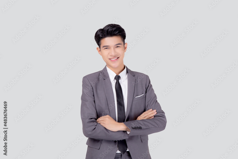 Portrait businessman in suit with crossed his arms standing isolated on white background, young asian business man is manager or executive having confident is positive with success. Portrait businessman in suit with crossed his arms standing isolated on white background, young asian business man is manager or executive having confident is positive with success.