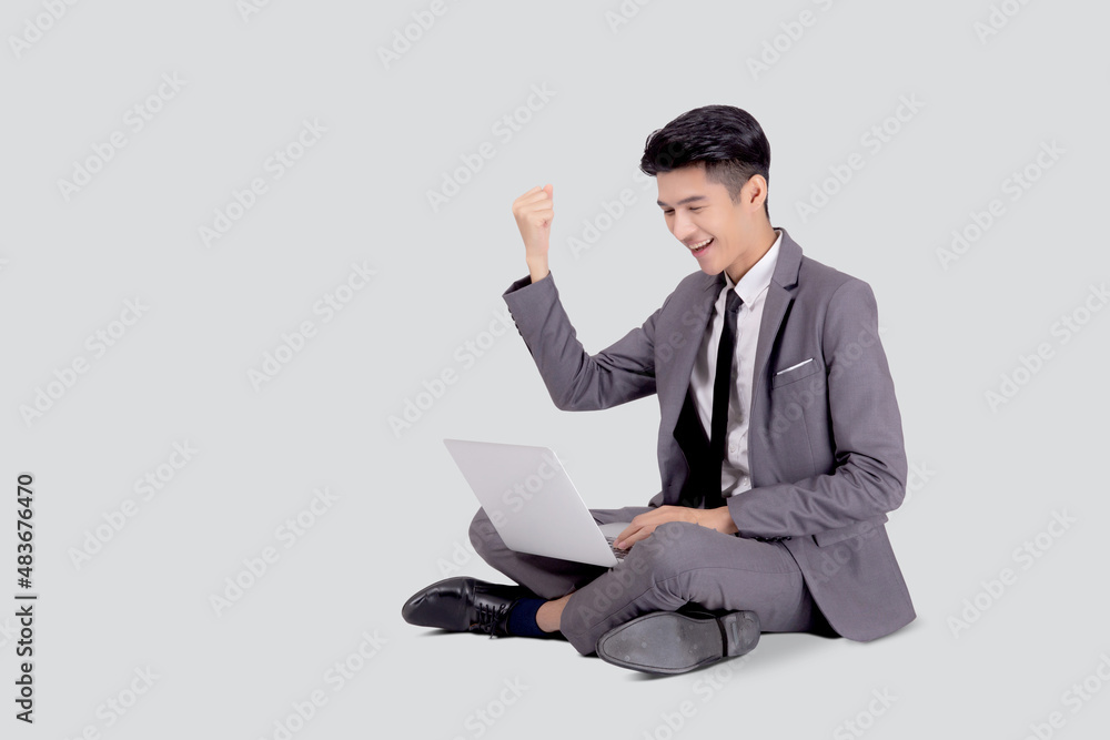 Young asian business man sitting work on laptop computer to internet online isolated on white background, businessman confident and notebook, freelance with success, marketing and communication. Young asian business man sitting work on laptop computer to internet online isolated on white background, businessman confident and notebook, freelance with success, marketing and communication.