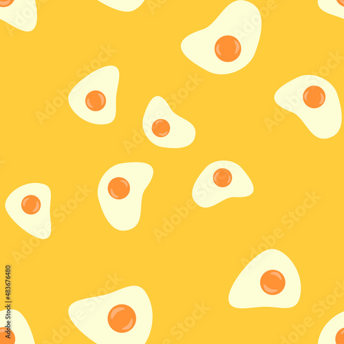 Seamless pattern with fried eggs. Abstract pastel pattern with eggs. Random, chaotic yellow background with cute omelette.