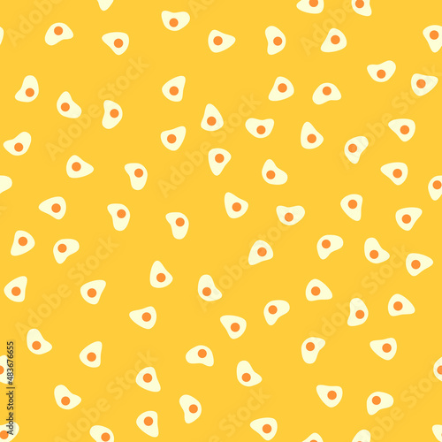 Fototapeta Naklejka Na Ścianę i Meble -  Seamless pattern with fried eggs. Abstract pastel pattern with eggs. Random, chaotic yellow background with cute omelette.