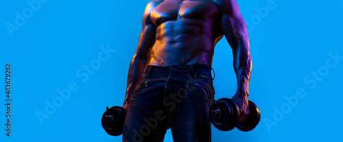 Banner templates with muscular man, muscular torso, six pack abs muscle. Strong man working out with dumbbells on blue background. Man lifting the dumbbells. Strength and motivation.