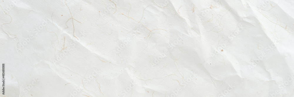 Obraz premium Brown wrinkled paper, Japanese handmade mulberry crumpled paper texture background, banner, wallpaper, poster