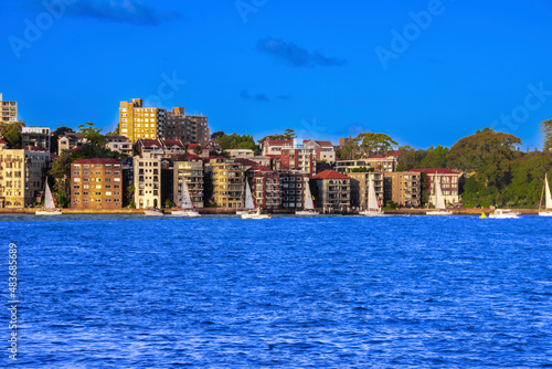 Sydney CBD skyline of buildings in the harbour waters NSW Australia