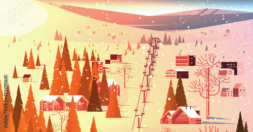 cableway in snowy mountains residential houses area ski resort christmas new year holidays celebration winter vacation