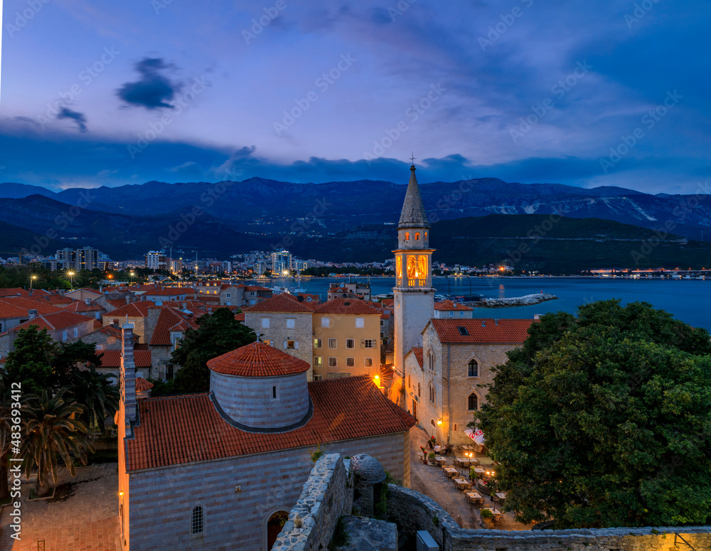 Obraz premium Budva Old Town with Holy Trinity church from the Citadel in Montenegro at sunset