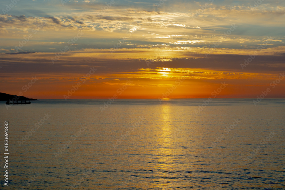 Naklejka premium sunset in the sea