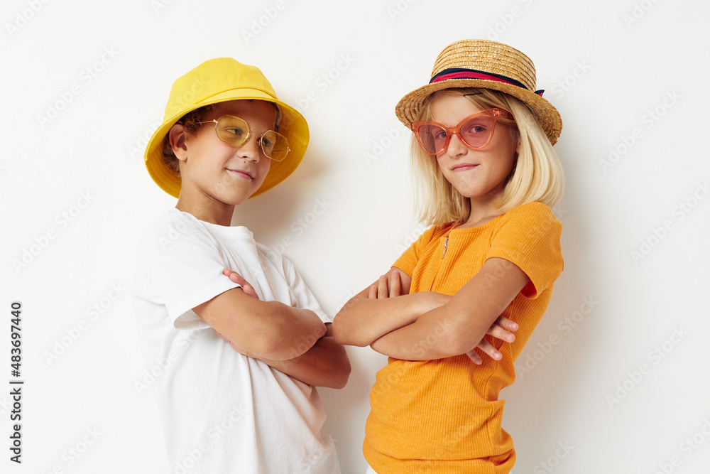 boy and girl wearing hats fashion glasses posing friendship fun boy and girl wearing hats fashion glasses posing friendship fun
