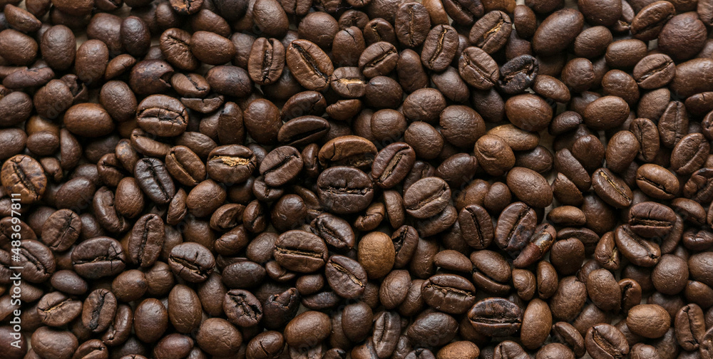 Top view of roasted coffee bean background. Top view of roasted coffee bean background.