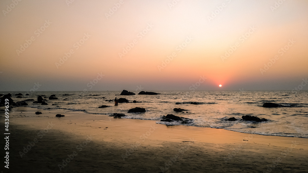 Stunning sunset at the sea in India. Arambol, GOA. - obrazy, fototapety, plakaty 