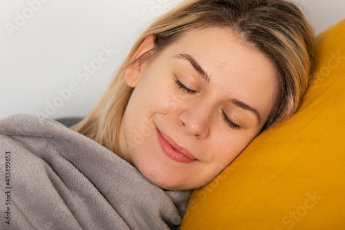  Sick woman lying on the couch